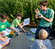 PHOTO: boy writing measurements