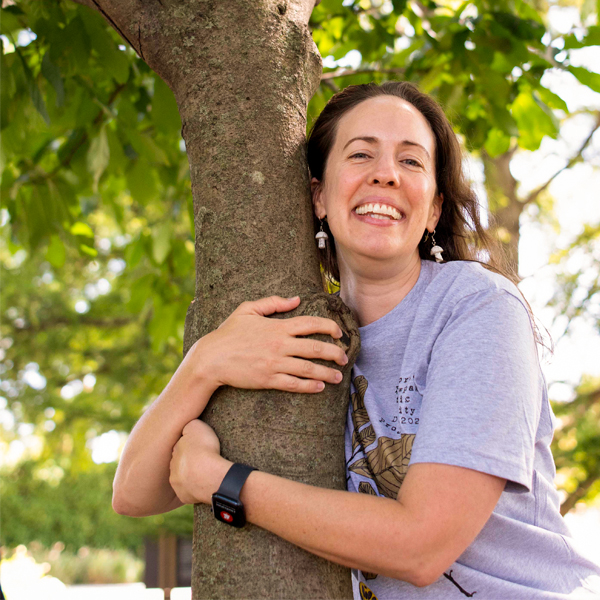 Susan Strickler with a pawpaw tree